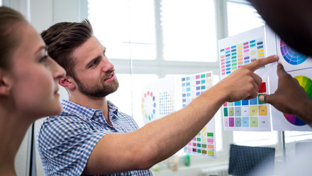 group-graphic-designers-interacting-color-chart.jpg